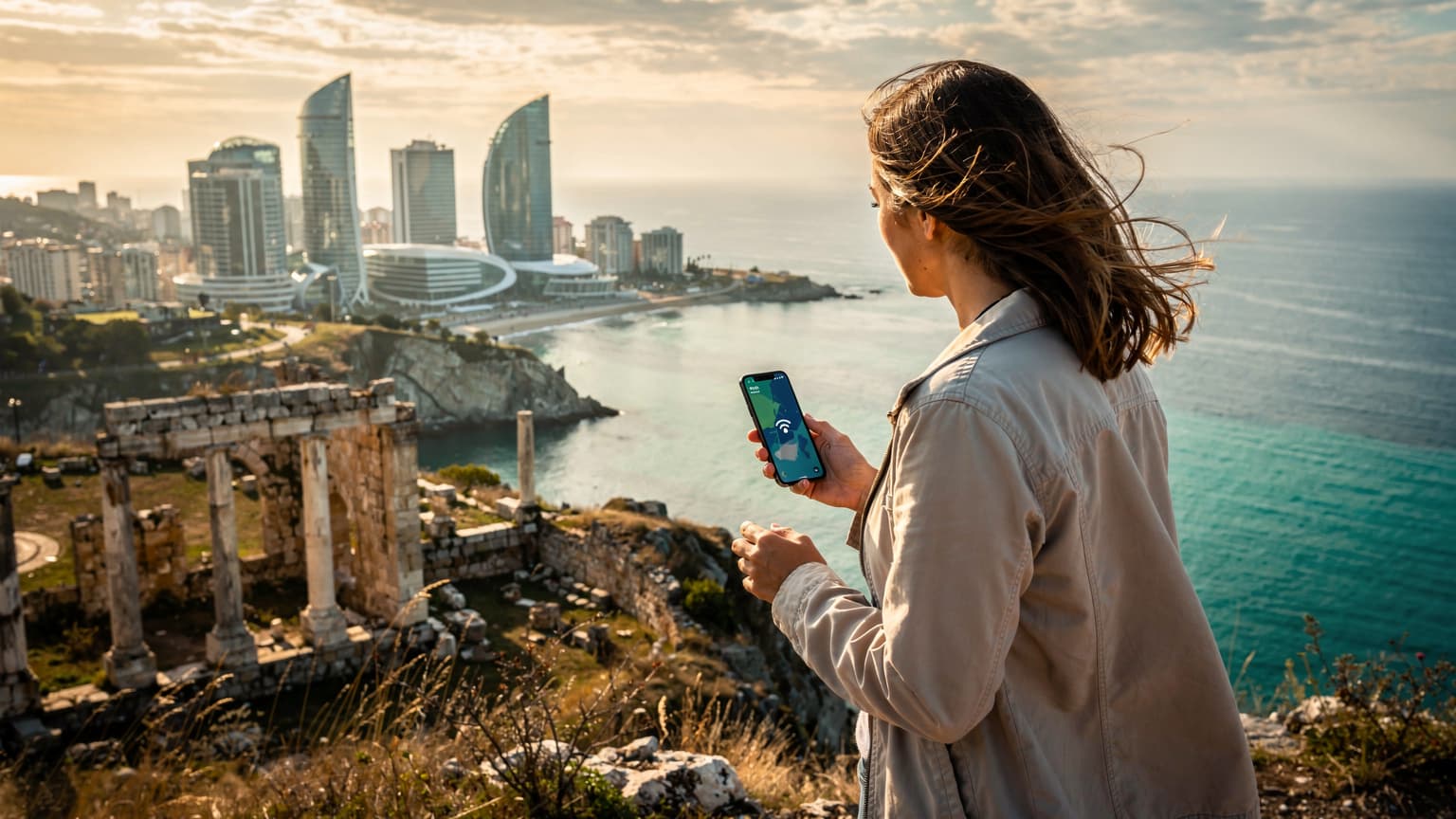 A cinematic wide shot of a traveler holding a smartphone, overlooking a composite landscape of modern Batumi architecture and ancient Cyprus ruins by the sea, under golden hour light, symbolizing seamless travel and connectivity.