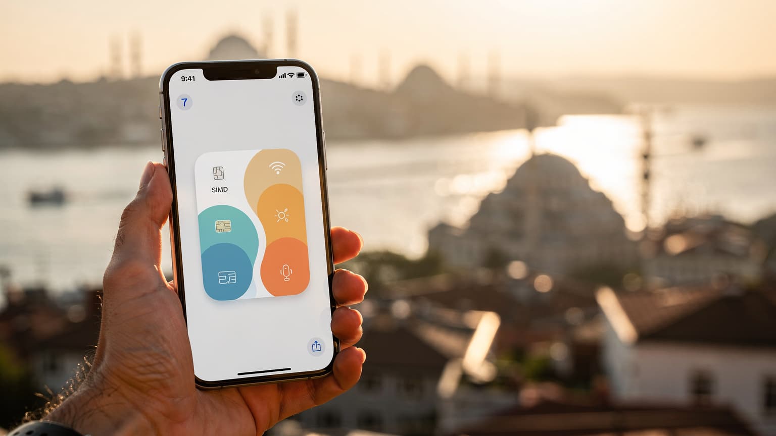 A modern smartphone held in a hand, displaying a generic connectivity interface, against a blurred, sunlit backdrop of Istanbul, Turkey, symbolizing dual eSIM travel.